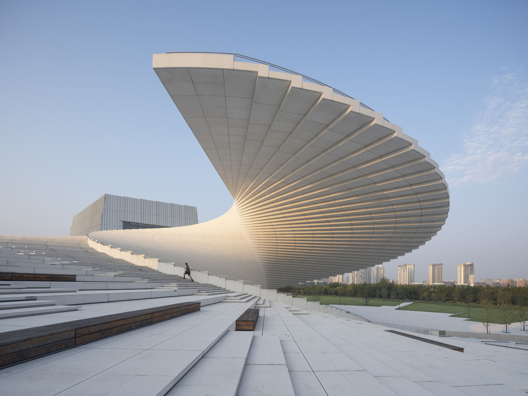 The white spiralling staircase rising from the opera house’s terraced public ground